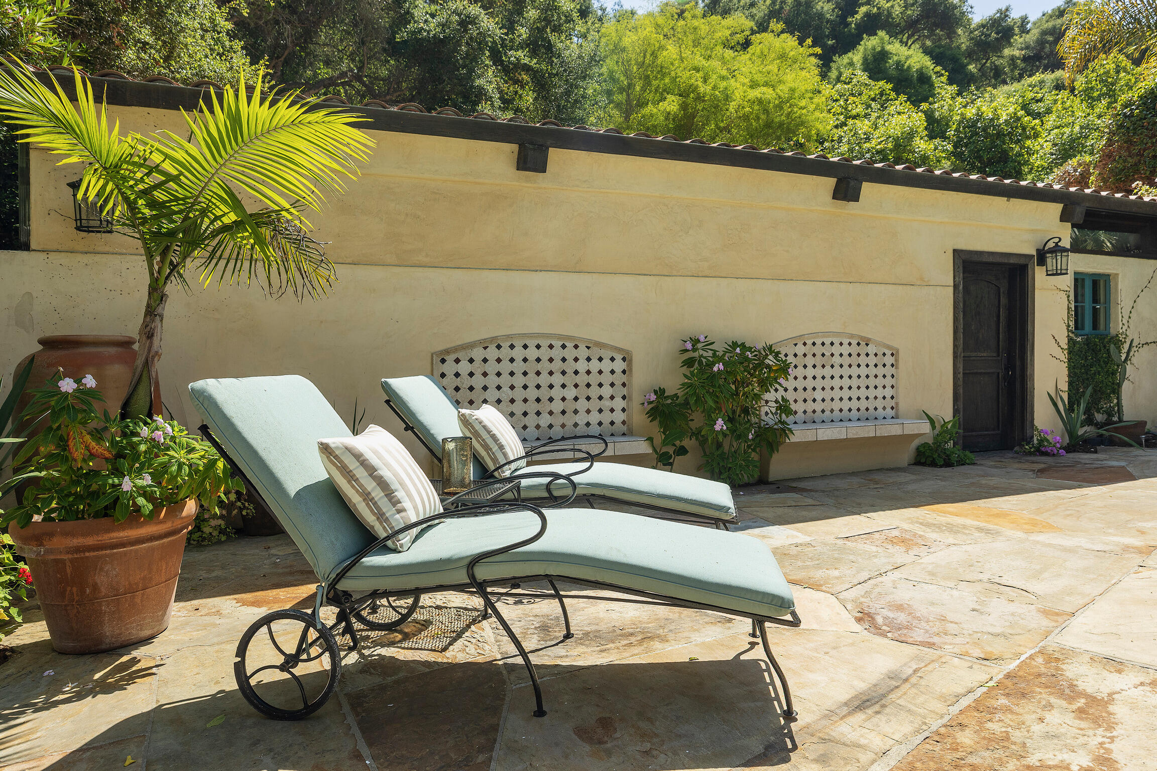 1493 Sycamore Canyon Road Montecito, CA 93108 - Photo 39 of 47 a view of a chairs and table in the patio