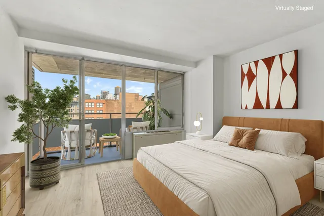a view of porch with a flat screen tv and a floor to ceiling window