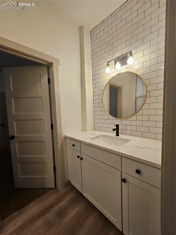 1138 Pine Street Pueblo, CO 81004 - Photo 16 of 22 a bathroom with a sink and a mirror