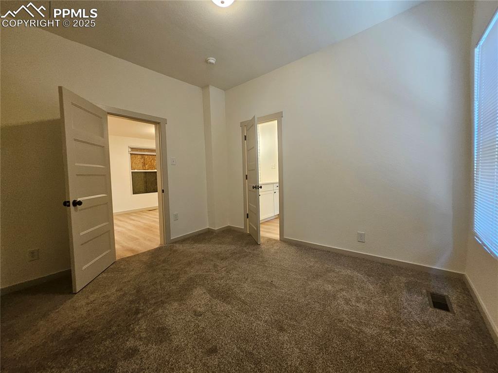 1138 Pine Street Pueblo, CO 81004 - Photo 18 of 22 an empty room with closet
