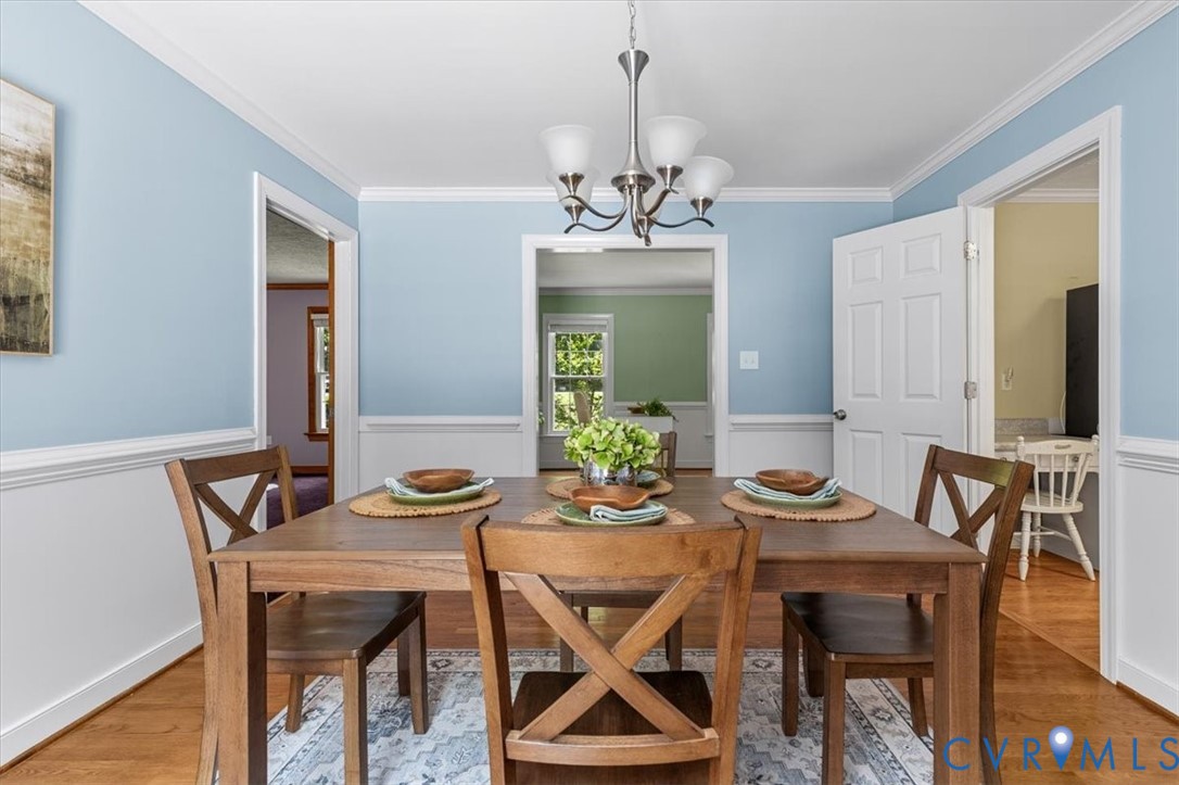 10330 Christina Road Chesterfield, VA 23832 - Photo 11 of 39 a view of a dining room with furniture and wooden floor
