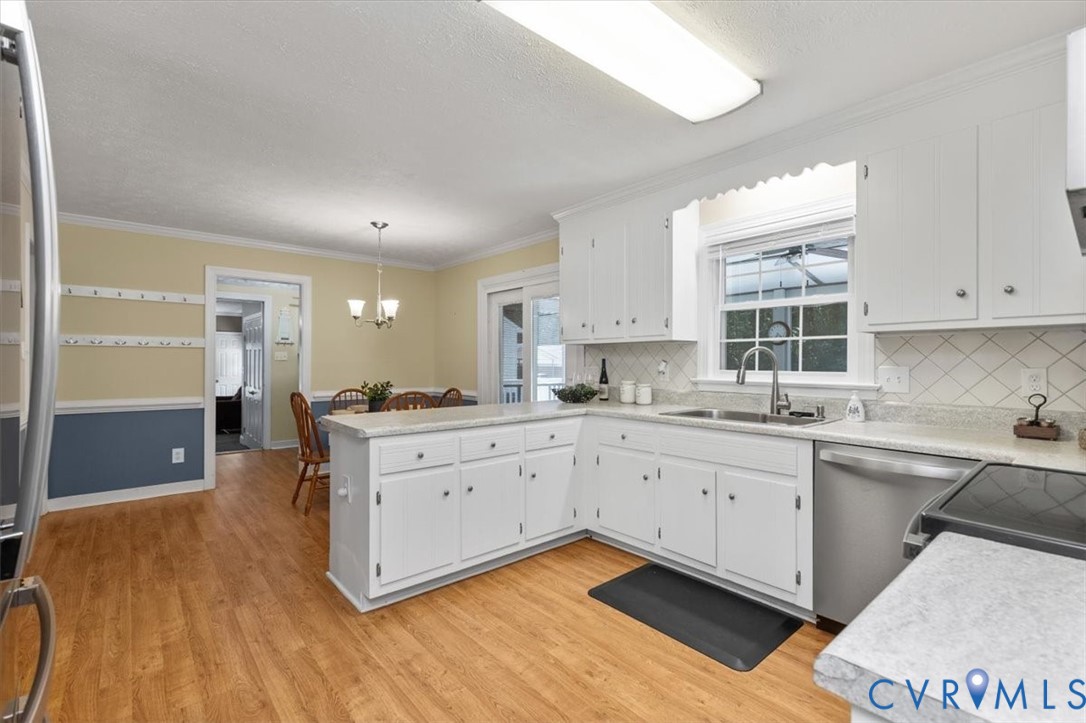10330 Christina Road Chesterfield, VA 23832 - Photo 12 of 39 a large kitchen with cabinets