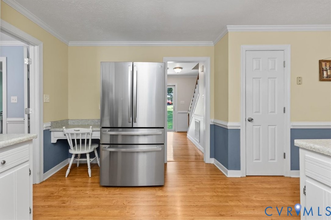 10330 Christina Road Chesterfield, VA 23832 - Photo 14 of 39 a kitchen with stainless steel appliances granite countertop a refrigerator and a stove top oven