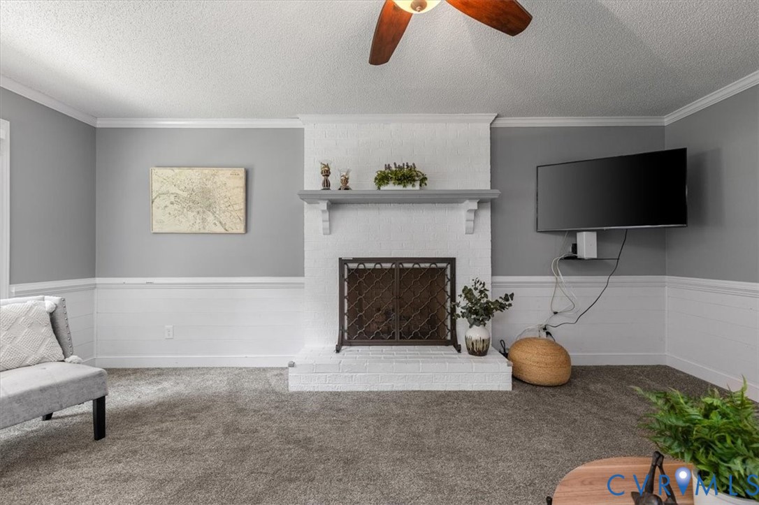 10330 Christina Road Chesterfield, VA 23832 - Photo 19 of 39 a living room with furniture and a fireplace