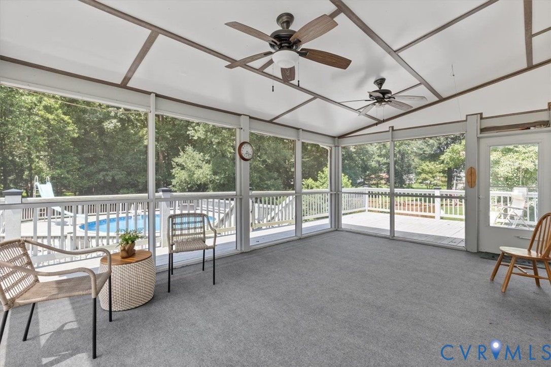 10330 Christina Road Chesterfield, VA 23832 - Photo 21 of 39 a living room with furniture and a floor to ceiling window