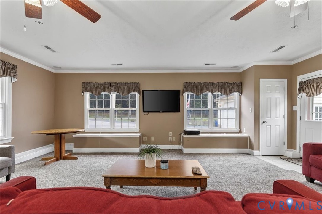 10330 Christina Road Chesterfield, VA 23832 - Photo 24 of 39 a living room with furniture and next to a window
