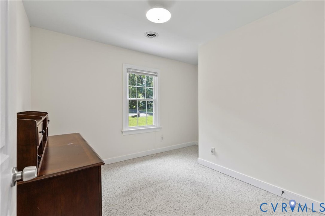 10330 Christina Road Chesterfield, VA 23832 - Photo 29 of 39 an empty room with windows