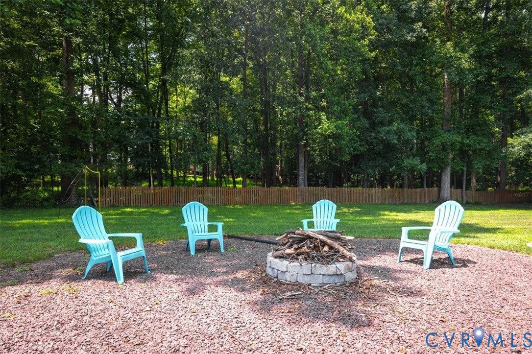 10330 Christina Road Chesterfield, VA 23832 - Photo 31 of 39 a view of a table and chairs in the patio