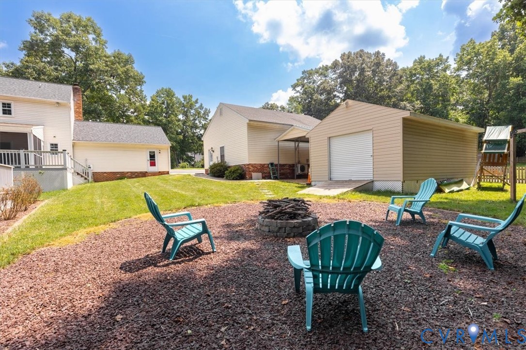 10330 Christina Road Chesterfield, VA 23832 - Photo 32 of 39 a view of backyard with swimming pool and patio