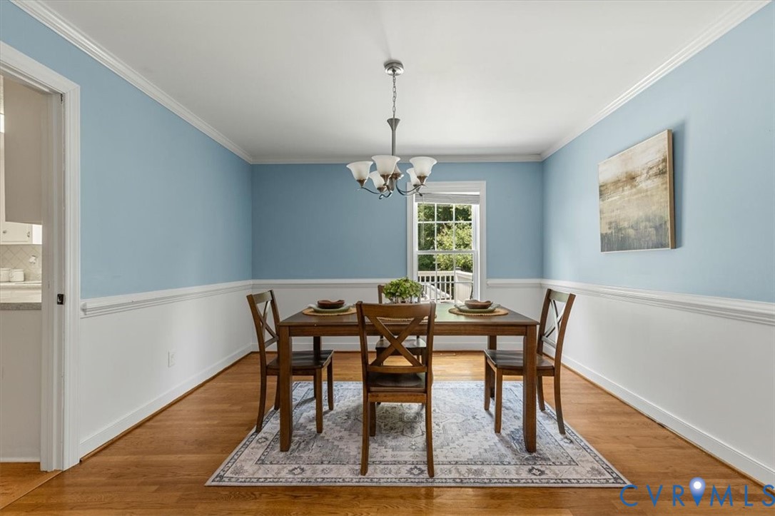 10330 Christina Road Chesterfield, VA 23832 - Photo 7 of 39 a view of a dining room with furniture window and wooden floor
