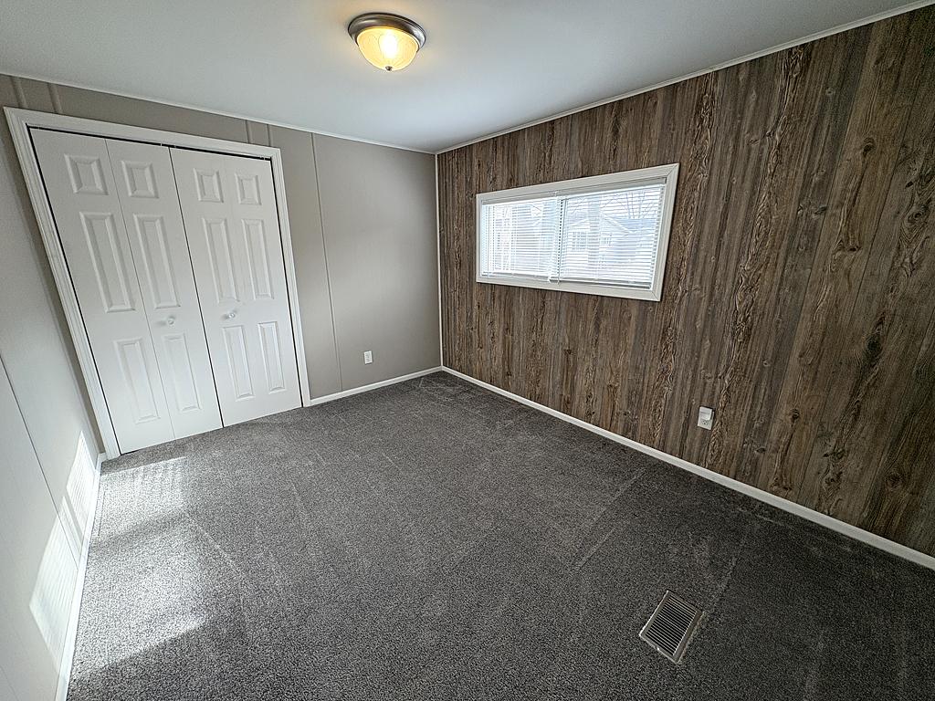 1134 Lakeview Road Elgin, IL 60123 - Photo 13 of 26 an empty room with windows