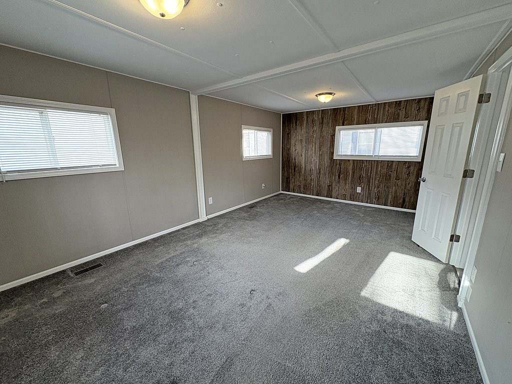 1134 Lakeview Road Elgin, IL 60123 - Photo 14 of 26 an empty room with windows