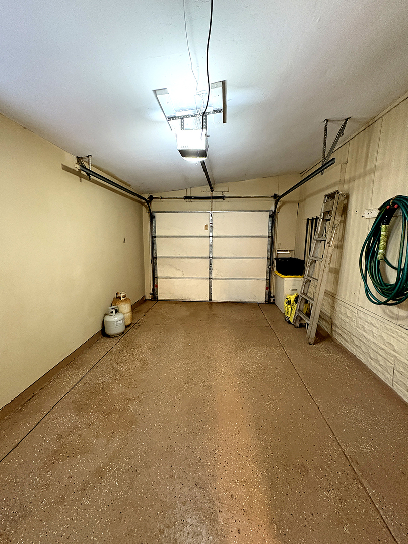 1134 Lakeview Road Elgin, IL 60123 - Photo 19 of 26 a view of a garage with equipment