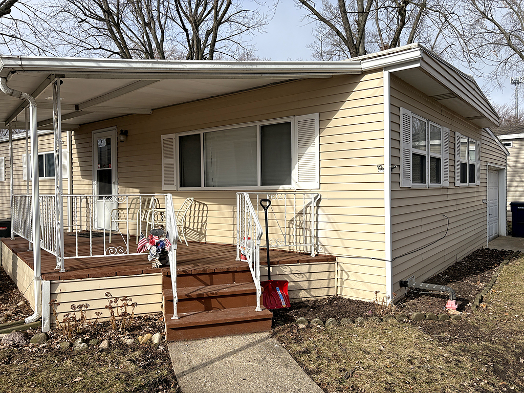 1134 Lakeview Road Elgin, IL 60123 - Photo 2 of 26 a front view of a house with stairs