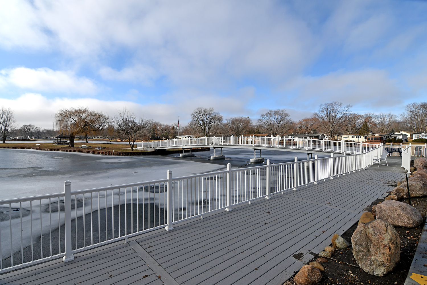 1134 Lakeview Road Elgin, IL 60123 - Photo 22 of 26 a view of a balcony with wooden floor and city view
