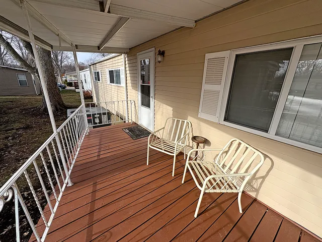 a view of a chairs on the deck