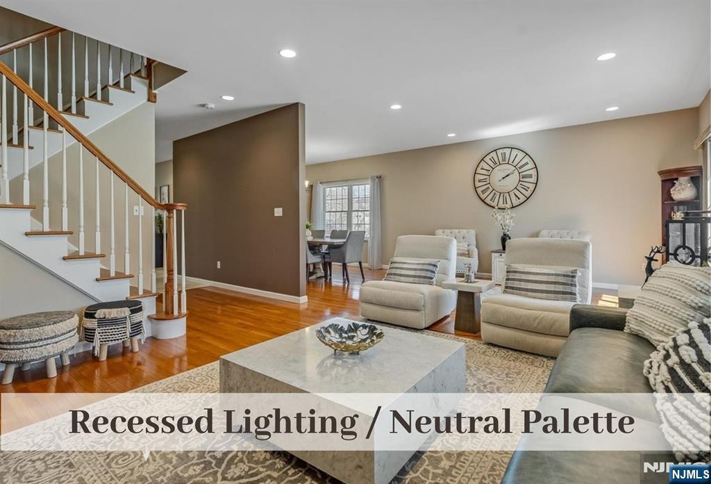 80 West Prospect Street Waldwick, NJ 07463 - Photo 17 of 50 a living room with furniture and a table