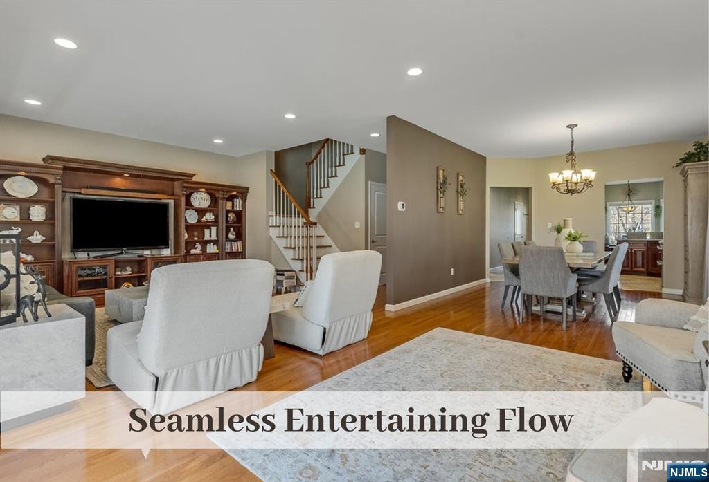 80 West Prospect Street Waldwick, NJ 07463 - Photo 18 of 50 a living room with furniture a flat screen tv and kitchen view