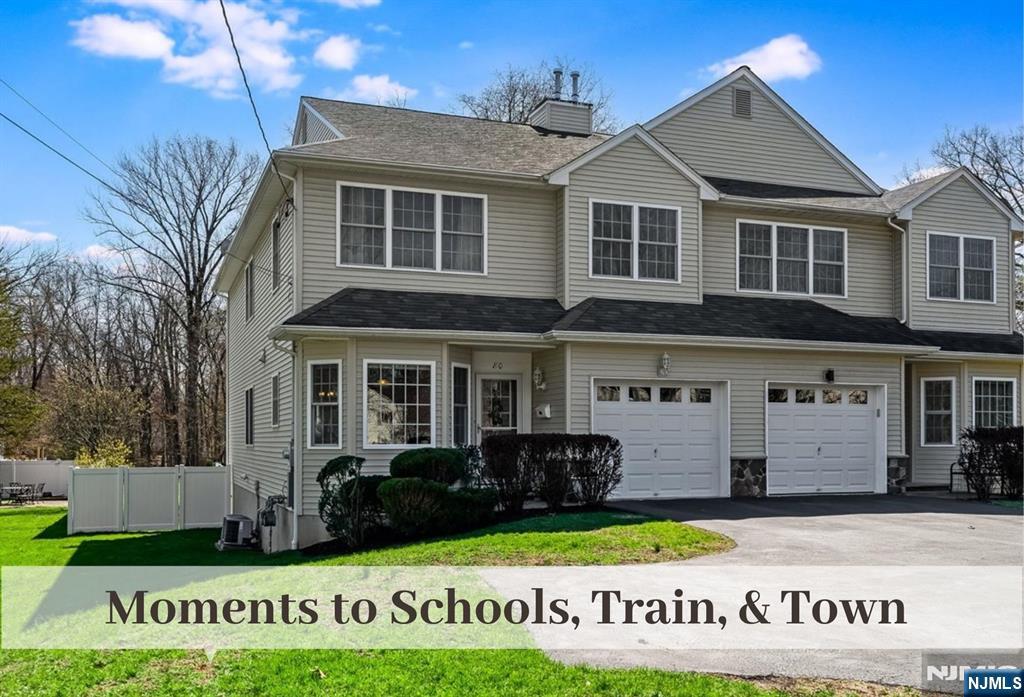 80 West Prospect Street Waldwick, NJ 07463 - Photo 2 of 50 a front view of a house with a yard