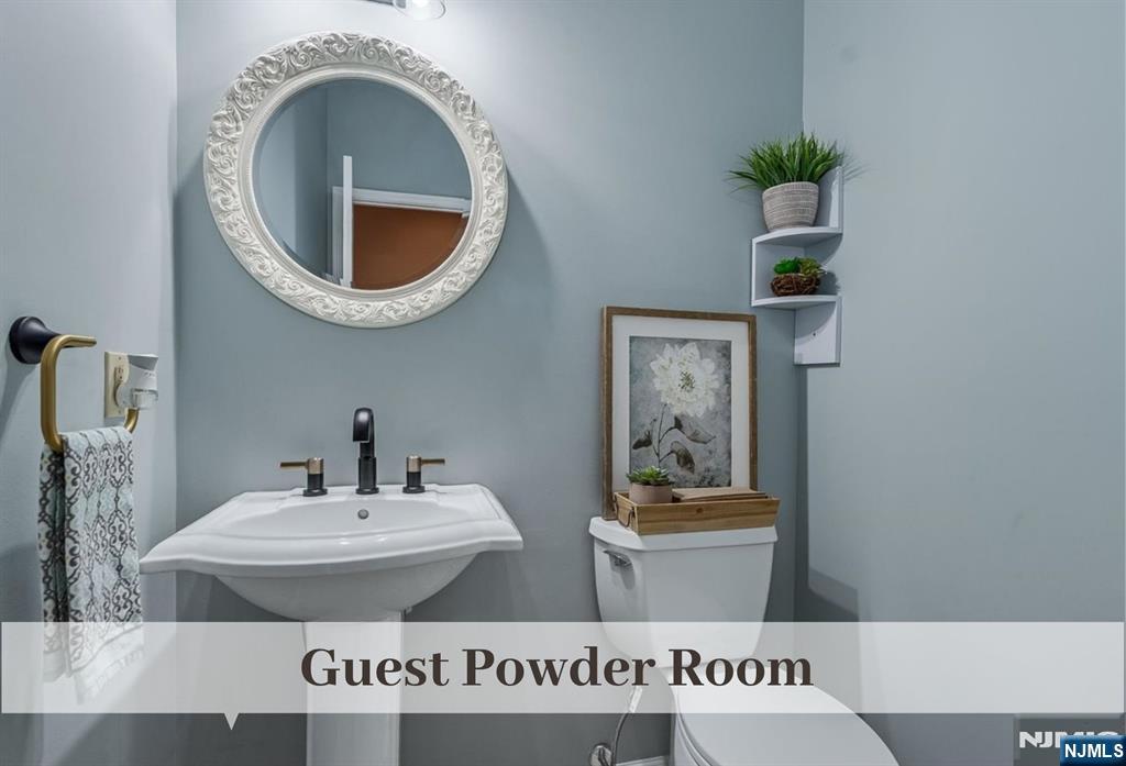 80 West Prospect Street Waldwick, NJ 07463 - Photo 22 of 50 a bathroom with a sink and a mirror