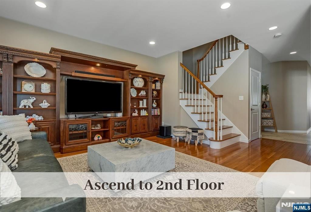 80 West Prospect Street Waldwick, NJ 07463 - Photo 24 of 50 a living room with furniture and a flat screen tv