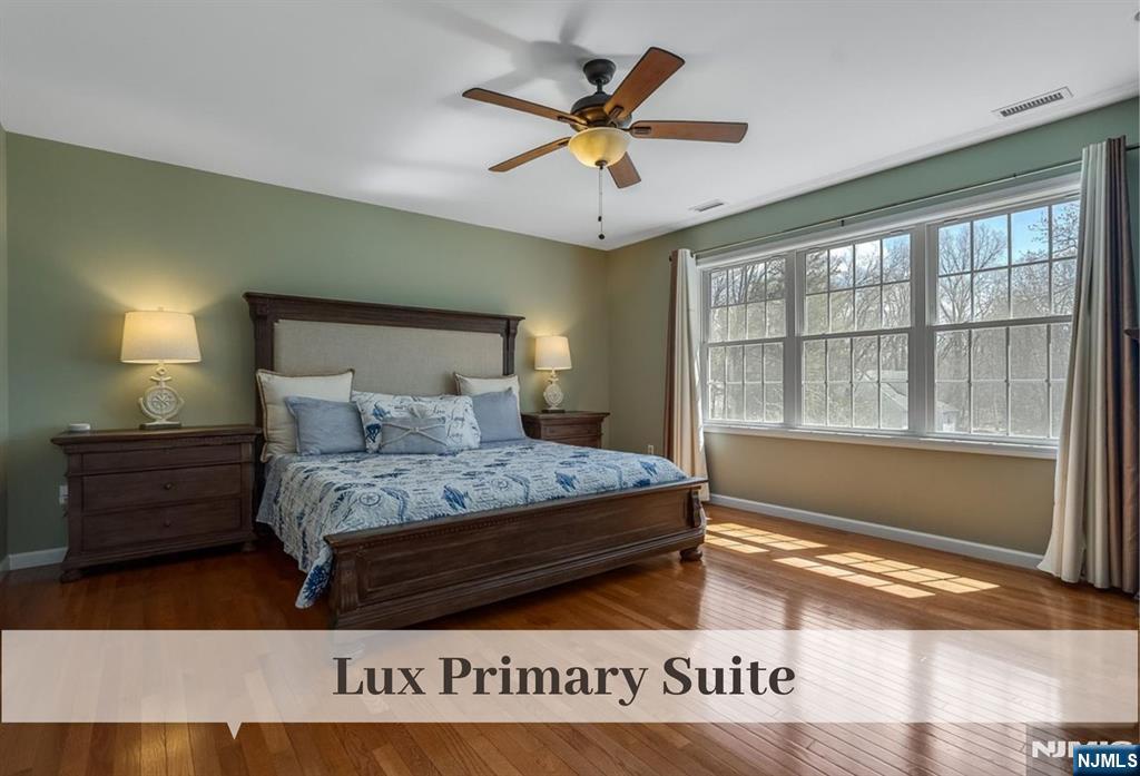 80 West Prospect Street Waldwick, NJ 07463 - Photo 25 of 50 a bedroom with a bed and window