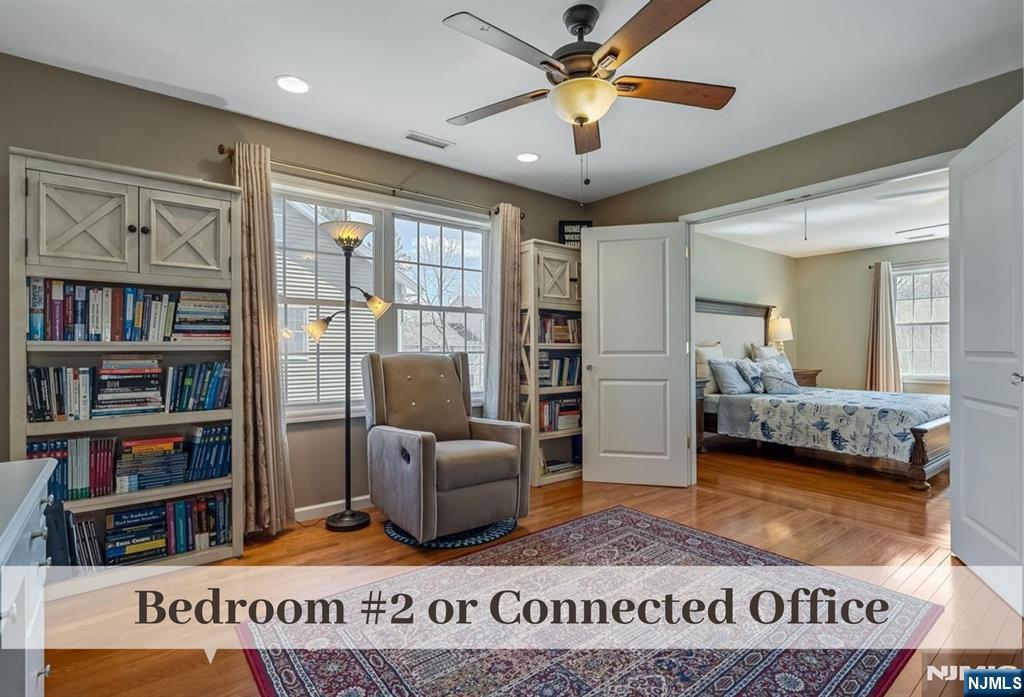 80 West Prospect Street Waldwick, NJ 07463 - Photo 29 of 50 a living room with furniture and a book shelf