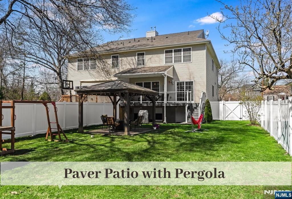 80 West Prospect Street Waldwick, NJ 07463 - Photo 40 of 50 a view of a house with a yard