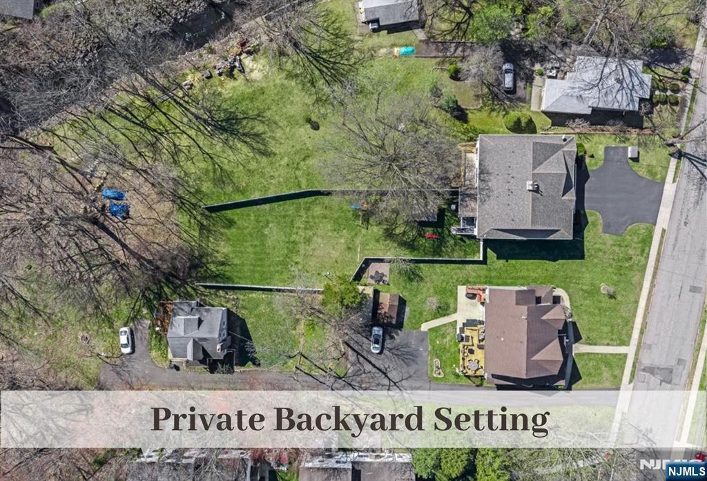 80 West Prospect Street Waldwick, NJ 07463 - Photo 42 of 50 an aerial view of a garden with swimming pool