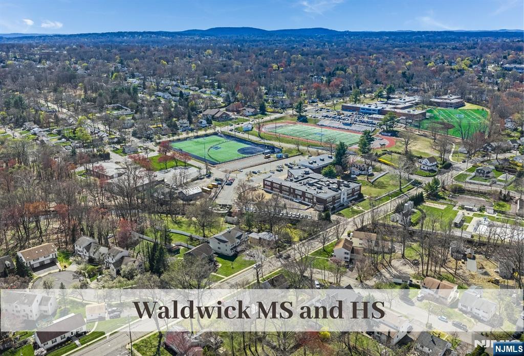 80 West Prospect Street Waldwick, NJ 07463 - Photo 47 of 50 a view of a lake with a mountain in the background