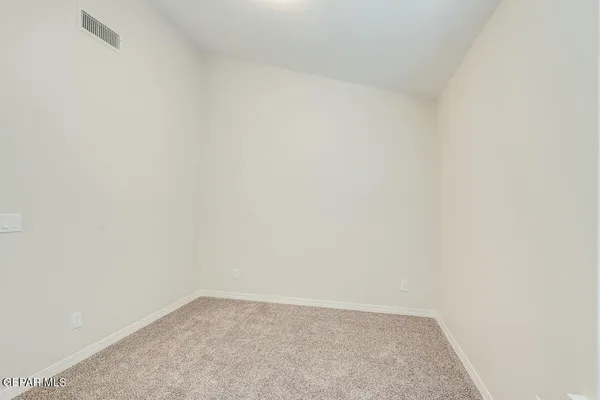 a bathroom with a toilet sink and a mirror