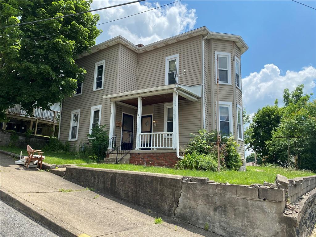 411 East Washington Street Rochester, PA 15074 - Photo 1 of 11 a house view with a garden space