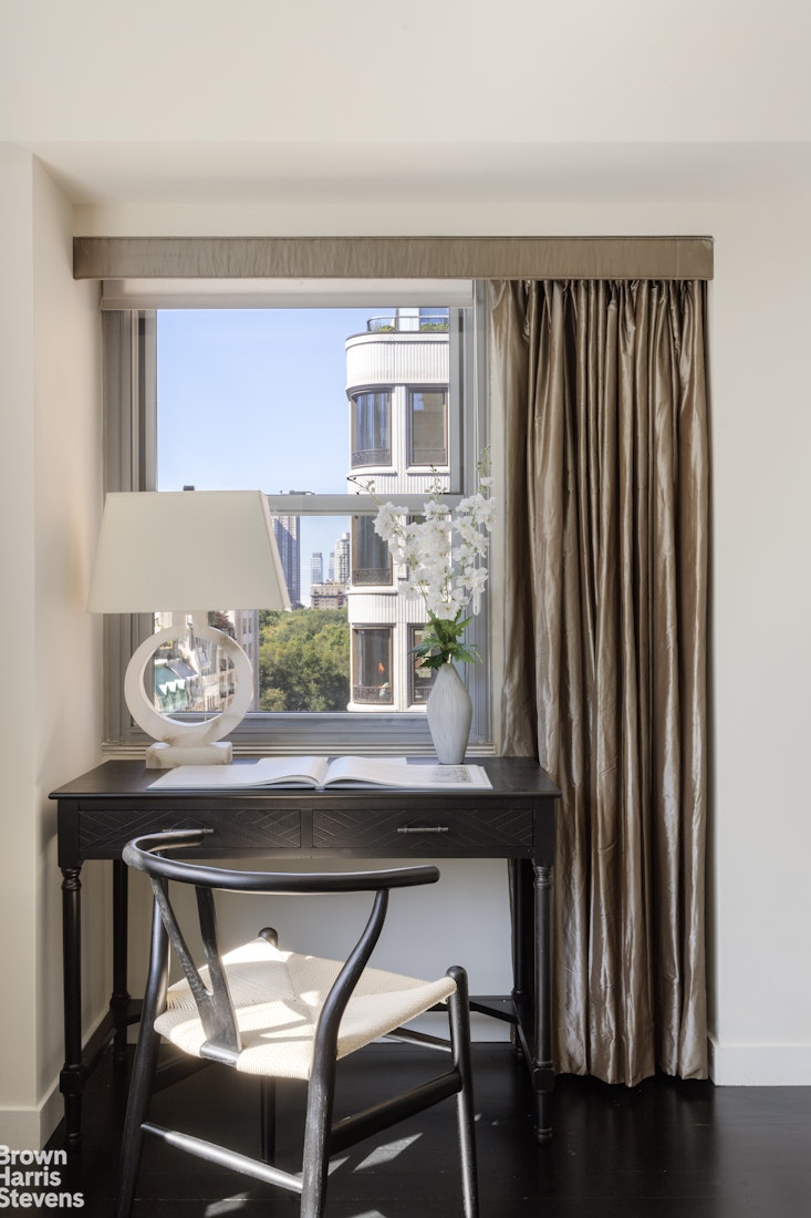 27 East 65th Street, Unit 11D Manhattan, NY 10065 - Photo 2 of 15 a view of a dining room with furniture and window