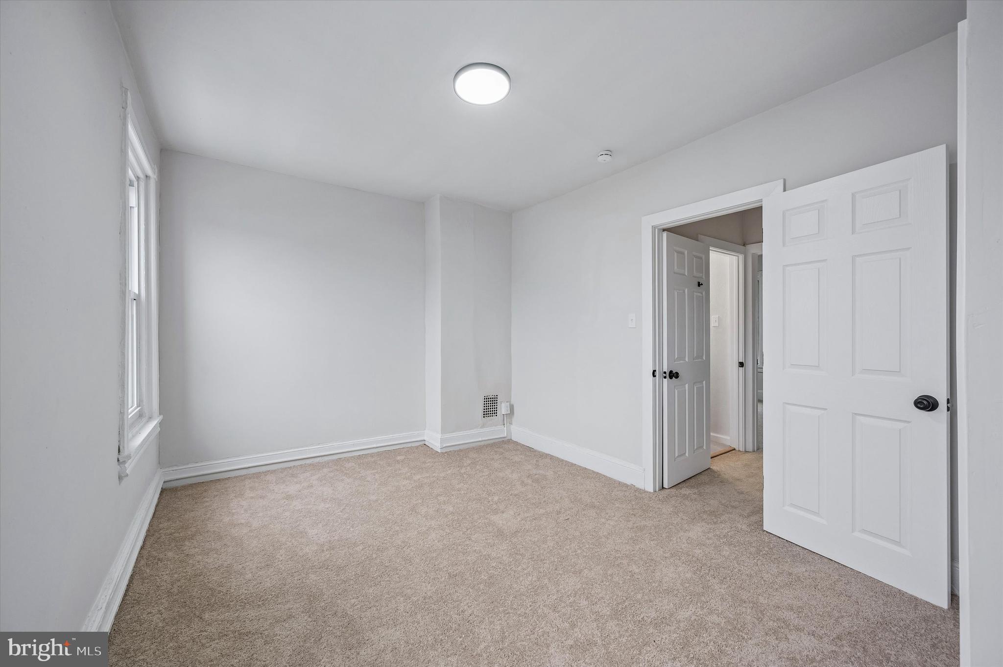 2433 South Millick Street Philadelphia, PA 19142 - Photo 12 of 15 a view of an empty room