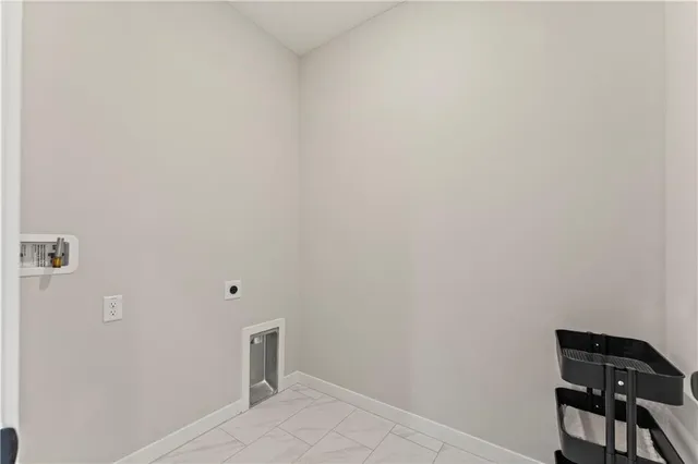 $415,950 | 411 Woodview Drive, Raymore, MO 64083