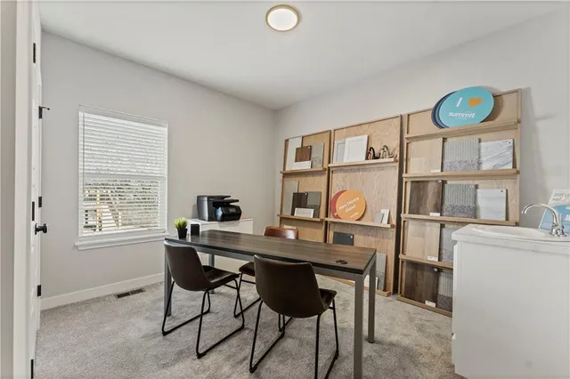 $415,950 | 411 Woodview Drive, Raymore, MO 64083