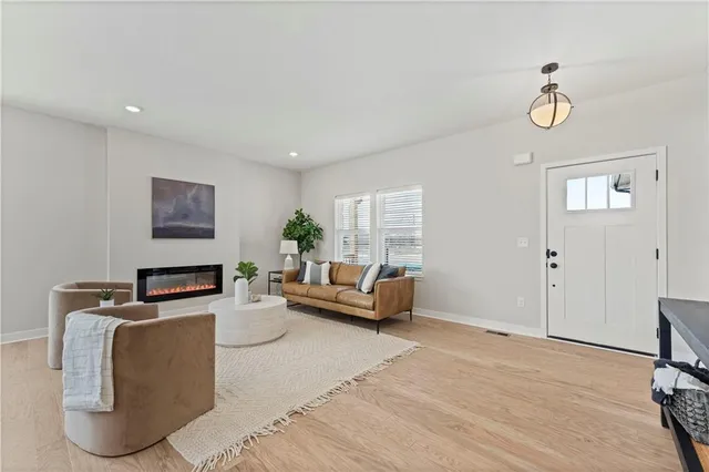 $415,950 | 411 Woodview Drive, Raymore, MO 64083