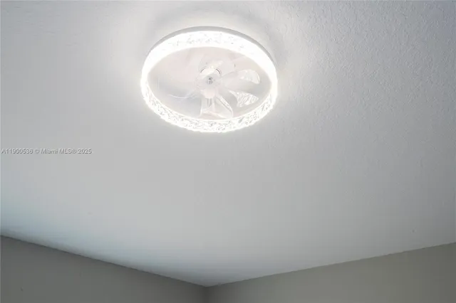 an empty room with a sink