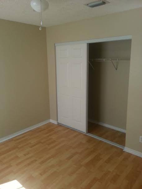 7434 Michigan Isle Road Lake Worth, FL 33467 - Photo 11 of 23 an empty room with a empty space and a window