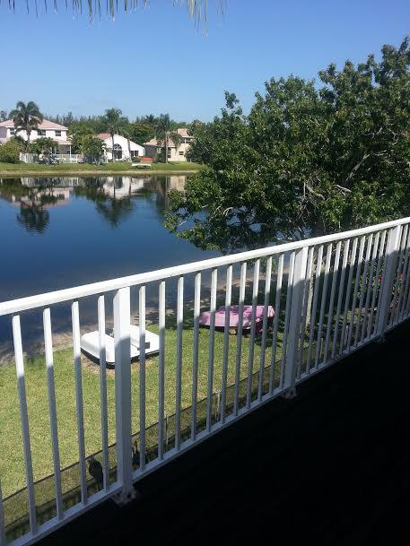 7434 Michigan Isle Road Lake Worth, FL 33467 - Photo 22 of 23 a view of city from a balcony