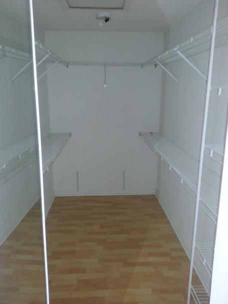7434 Michigan Isle Road Lake Worth, FL 33467 - Photo 23 of 23 a view of an empty walk in closet