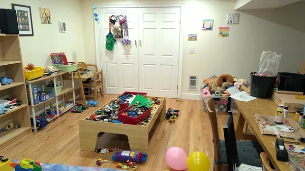 a bed room with a bed and a couch