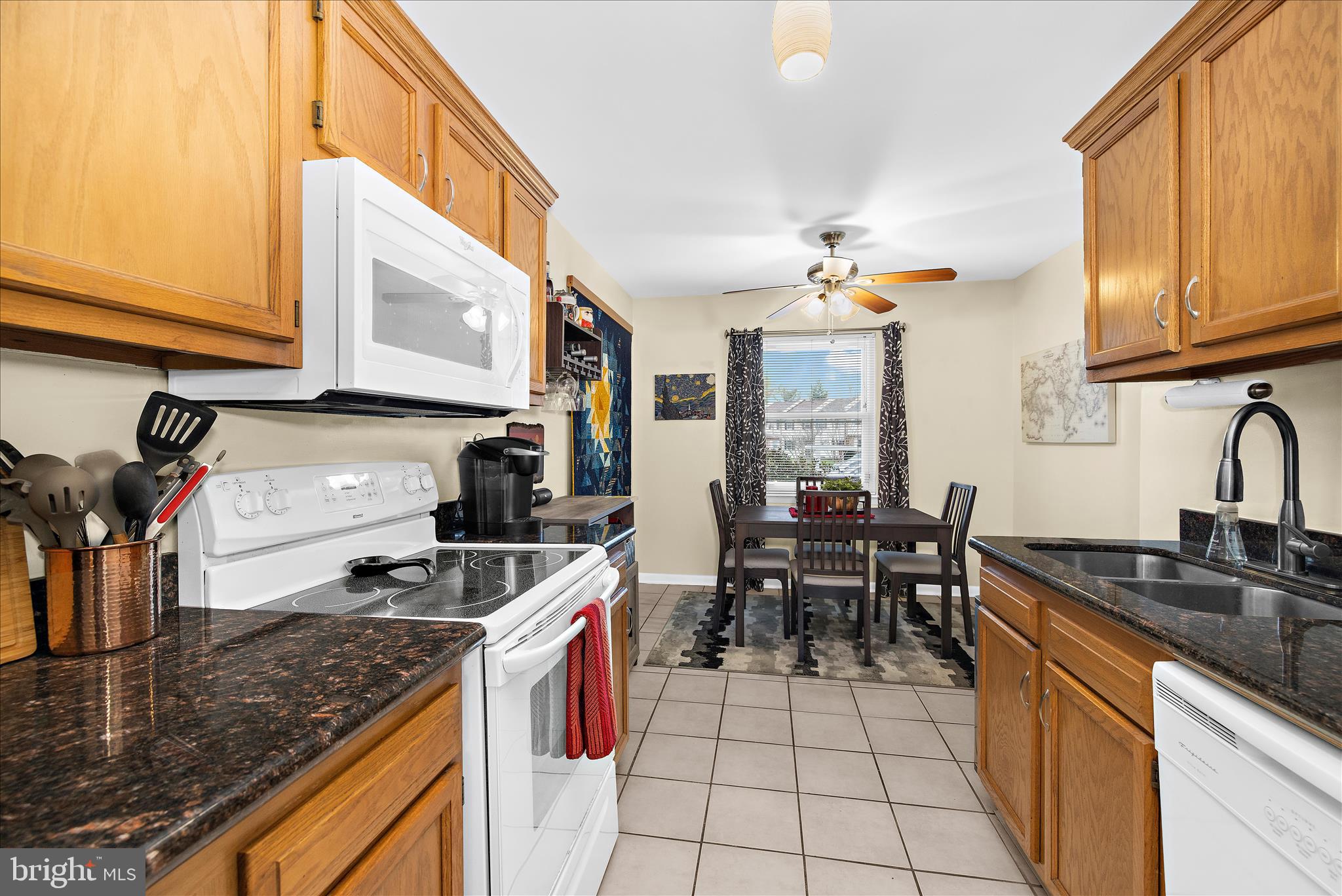 47 Vienna Court Frederick, MD 21702 - Photo 15 of 47 a kitchen with a stove a sink and cabinets