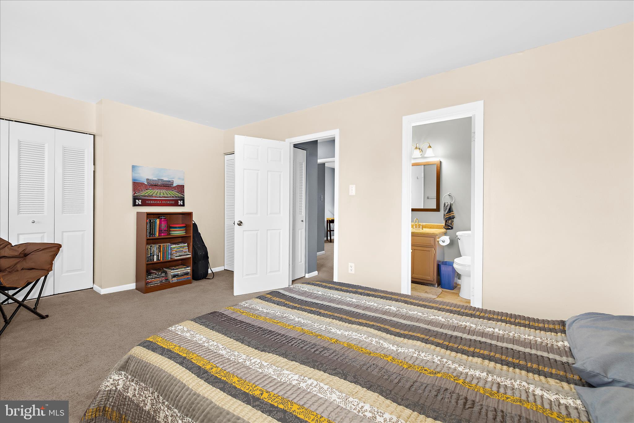 47 Vienna Court Frederick, MD 21702 - Photo 31 of 47 a bedroom with a bed and a chair