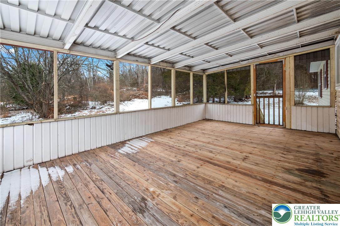 1111 Delabole Jct Road Pen Argyl, PA 18072 - Photo 13 of 26 a view of empty room with wooden floor and fan