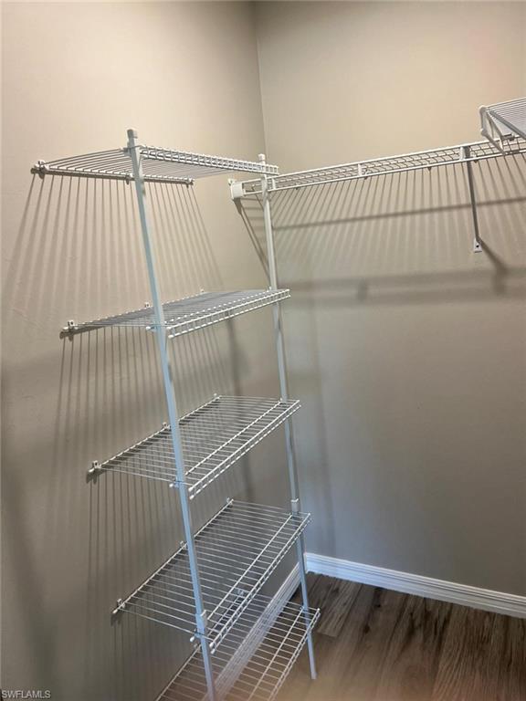 374 Compese Avenue South Lehigh Acres, FL 33974 - Photo 14 of 15 a view of a room with racks on the wall