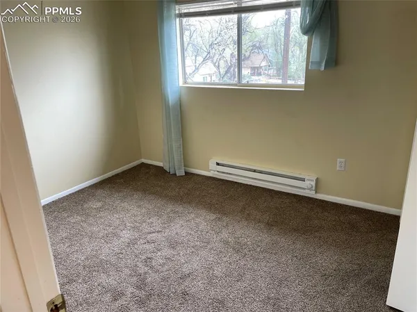 an empty room with a window