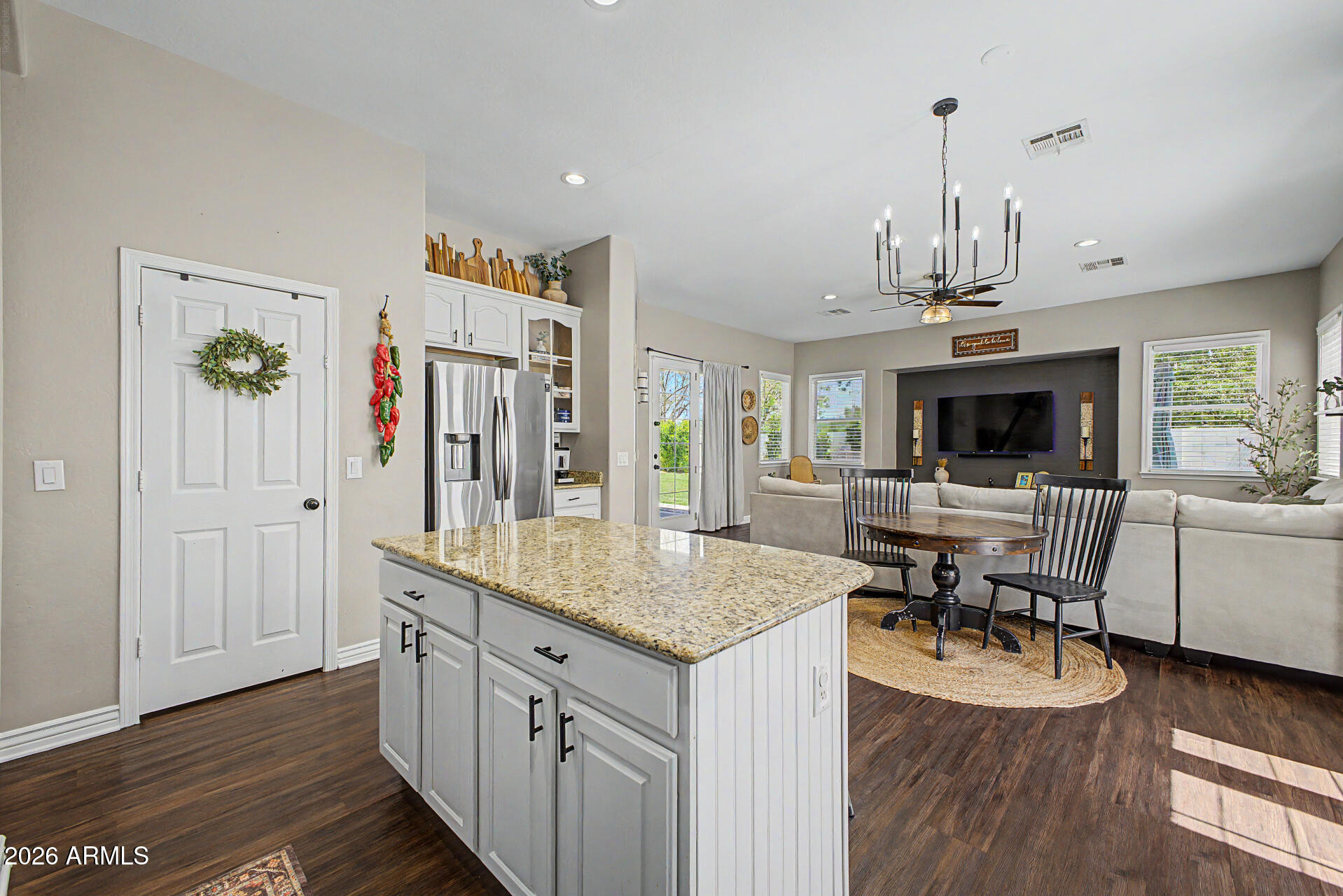 2065 South Porter Street Gilbert, AZ 85295 - Photo 16 of 36 a very nice looking dining room with a table and chairs