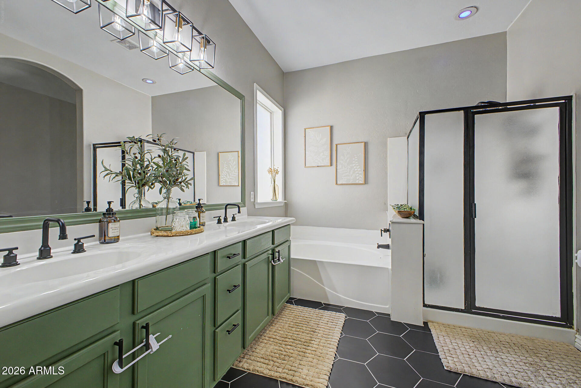 2065 South Porter Street Gilbert, AZ 85295 - Photo 22 of 36 a spacious bathroom with a double vanity sink mirror and shower