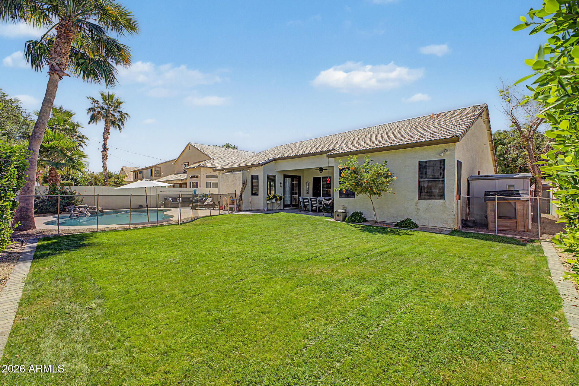 2065 South Porter Street Gilbert, AZ 85295 - Photo 35 of 36 a view of a house with a backyard